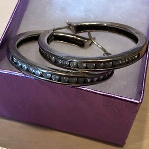 Rhodium plated hoop earrings w/ cubic zirconia